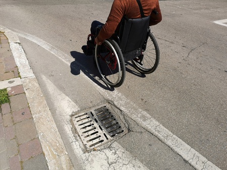 wheelchair in the streets of the cityの写真素材