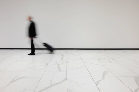 out of focus people walkingの写真素材