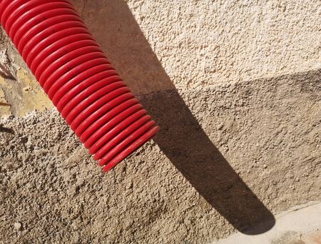 red plastic tube on construction siteの写真素材