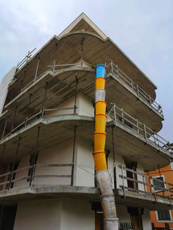house under construction with rubble pipe