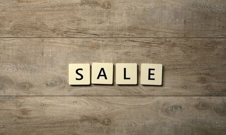 SALE symbol on wooden table - Illustrationの写真素材