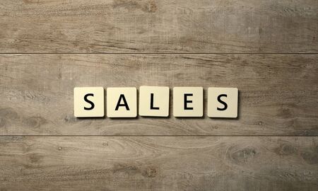 SALES symbol on wooden table - Illustrationの写真素材