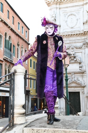 VENICE, ITALY - MARCH 4: Detail of unidentified masked person standing in front of Chiesa di San Moise in Venice, Italy, on 4 March during Venice carnival (held on 26 February - 8 March 2011).のeditorial素材