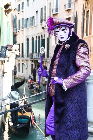 VENICE, ITALY - MARCH 4: Detail of unidentified masked person standing in front of Chiesa di San Moise in Venice, Italy, on 4 March during Venice carnival (held on 26 February - 8 March 2011).のeditorial素材