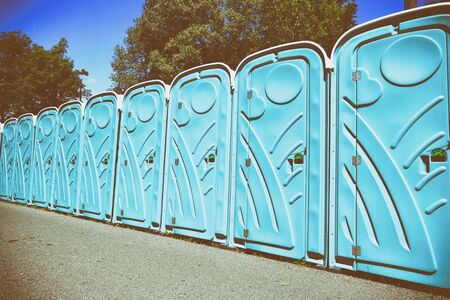 Vintage. View of the portable public toilets, old film effectの写真素材