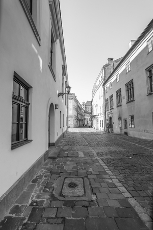 A view of the oldest street in Krakow - Kanonicza street - Poland. black & whiteの写真素材