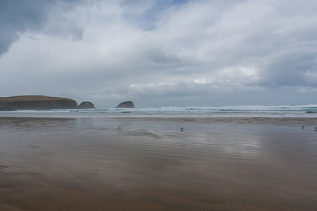 View of the sandy beach in cloudy day