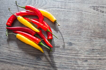 Hot paprika on a wooden stone tableの写真素材
