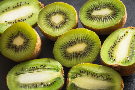 Kiwi fruits on a tableの写真素材