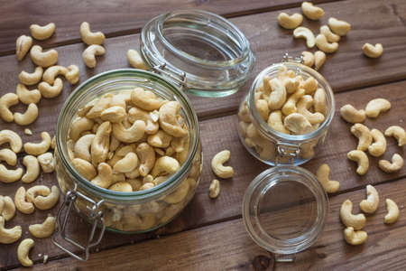 Cashew nuts on a wooden backgroundの写真素材