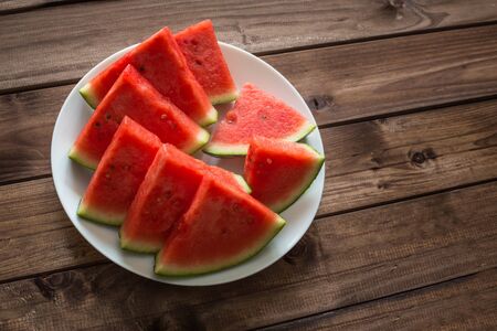 Juicy watermelon on a plateの写真素材