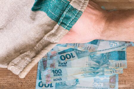 Brazilian money  / reais in the bagの写真素材