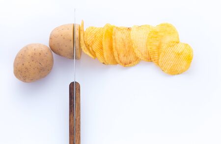 Potato slice in potato chips isolated on white backgroundの写真素材