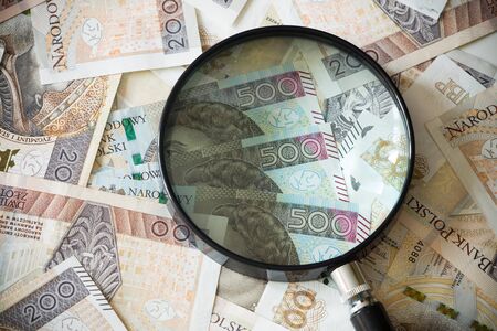 Polish money under the magnifier / high nominalの写真素材