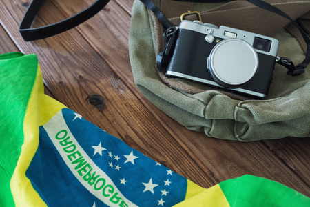 Brazil flag and camera. The concept of a holiday tripの写真素材