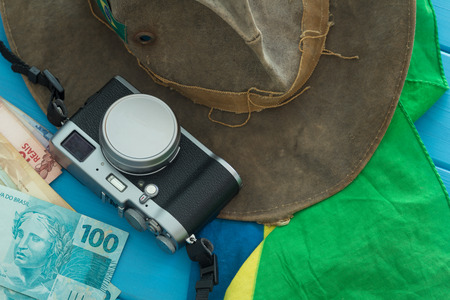 Brazil flag, money, hat and camera. The concept of a holiday tripの写真素材