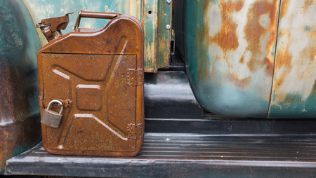 stylish old rusty gasoline canisterの写真素材