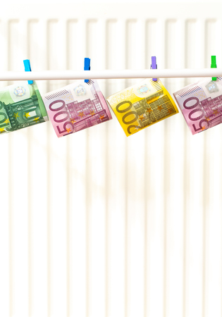 Euro, the highest denominations hanging on the dryer. conceptの写真素材