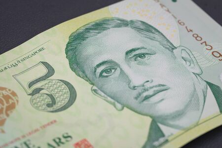 Singapore money. Five dollar banknoteの写真素材