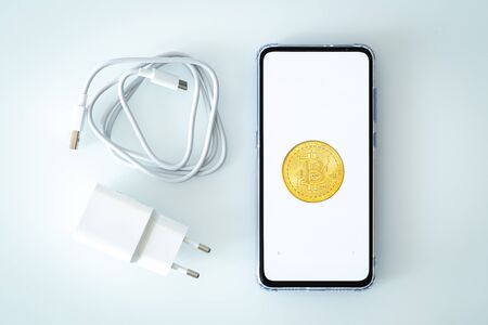 Phone with a bitcoin, Virtual moneyの写真素材