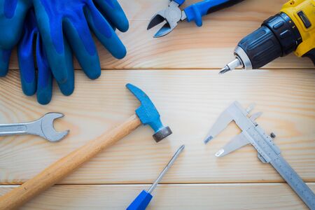 Workshop tools on a wooden boardの写真素材
