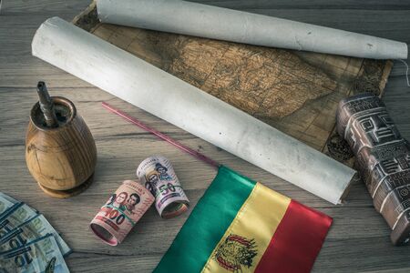 Bolivia. Country flag on the background of the old map and things associated with Bolivia