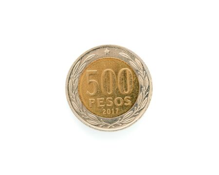 Chilean money, 500 pesos coin / white backgroundの写真素材