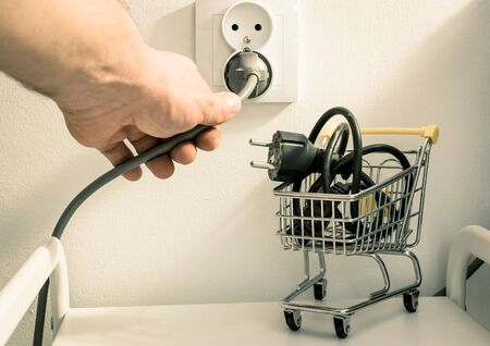 electricity price increases, Concept, Shopping trolley with cable and electrical outlet