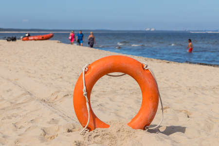 Lifebuoy on the beach, Holiday periodの写真素材