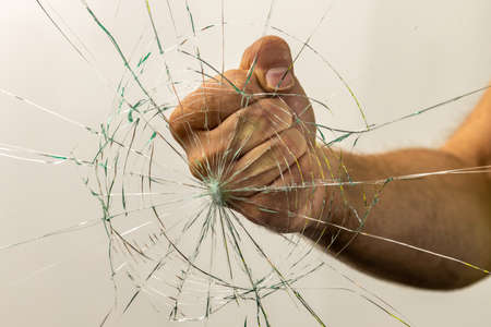 A fist breaking glass, The concept of anger and aggression