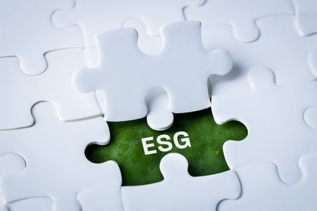 ESG, The concept of environmental, social and corporate governance, The idea of sustainable development of the company, ESG word on the green leaf among the puzzlesの写真素材