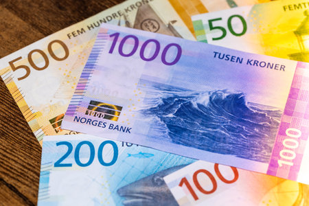 Norwegian money lying on the table, Norway currency, Finance and home budget concept, Flat lay,close up, Financial backgroundの写真素材