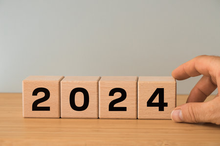 2024, welcome new year, date on wooden blocks, concept of new year's plans in business. copy space