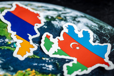 Flags of Armenia and Azerbaijan against the background of the world, concept, difficult mutual relations and conflict between Azerbaijan and Armeniaの写真素材