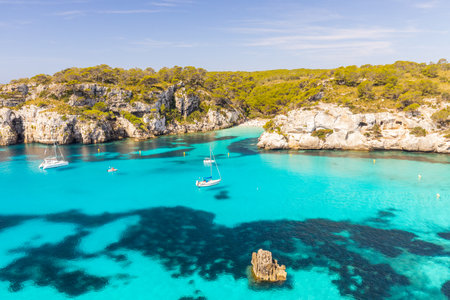 Menorca Island in the Balearic Islands. Holiday landscape of a coastline of beaches and beautiful...