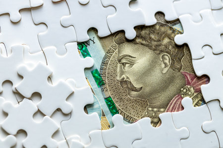 Polish zloty Hidden Under Puzzle Pieces, Business Concept, Poland Currency, Market Analysis, Exchange Rate. 500 zloty banknote, copy space, close upの写真素材