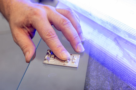 Gluing hinges to glass with UV glue