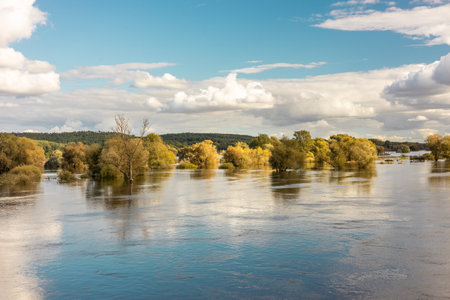 Landscape of the picturesquely spread Odra River on the Polish-German border. Concept. Threat and beauty of natureの写真素材