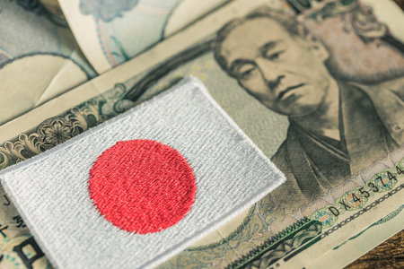 Japan money. Japan flag and 10000 thousand Japanese yen banknote. Financial concept, close upの写真素材