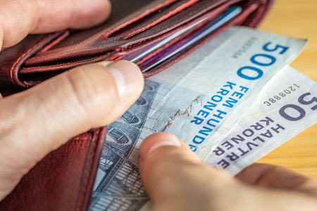 Denmark money. 50 and 500 Danish kroner taken out of wallet. Financial economic concept, close upの写真素材