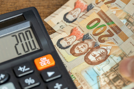 Bolivia financial calculations. Bolivian money and calculator, 200 boliviano banknotes. Business economic concept. Financial analysisの写真素材