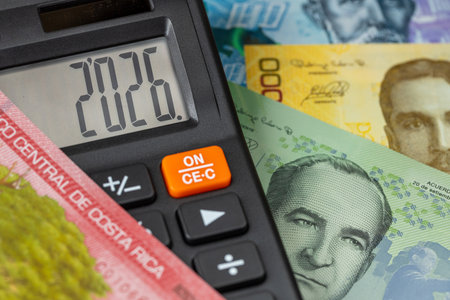 Costa Rica 2026 year. Financial business concept. Money and calculator with date 2026. Market analysis. Costa Rican colones. exchange rate. Economic background. closeupの写真素材