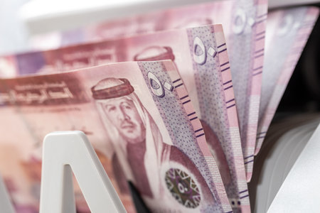 Jordan dinar. Financial and business concept. Jordanian money in a bill counting machine. JOD...