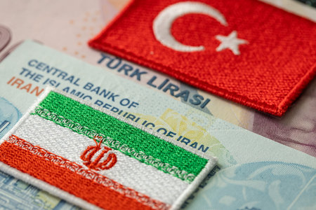 Symbols of Turkey and Iran against the background of the currencies of both countries, Business...