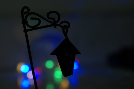 Lantern in the night with colorful bokeh background.の写真素材