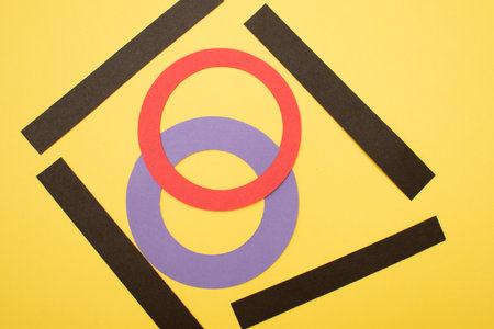 Colorful paper numbers on a yellow background. Minimal concept.の写真素材