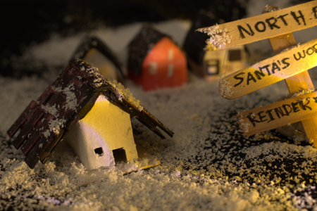 Miniature houses in the snow. Christmas concept. Selective focus. Toned.の写真素材