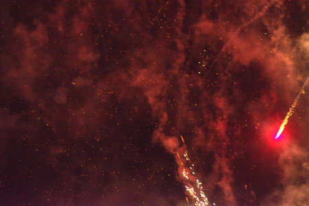 firework in the night sky, closeup of photo with fire