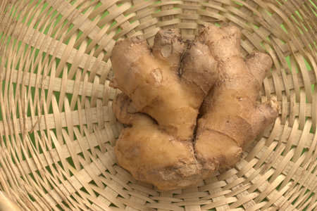 Ginger root in a wicker basket, closeup of photoの写真素材