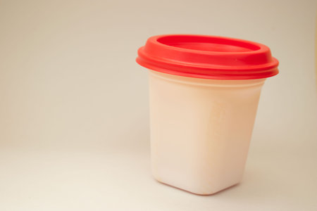 Plastic cup on a white background with filter effect retro vintage styleの写真素材